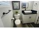 Well-lit bathroom featuring modern fixtures and decor at 6401 30Th N Way, St Petersburg, FL 33702