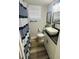 Bright bathroom with a modern vanity, sink, and toilet at 6401 30Th N Way, St Petersburg, FL 33702
