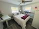 Cozy bedroom with abundant natural light, neutral tones and relaxing ambiance at 6401 30Th N Way, St Petersburg, FL 33702