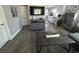 Open-concept living room with updated flooring and seamless connection to the kitchen at 6401 30Th N Way, St Petersburg, FL 33702