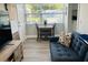 Cozy breakfast nook with a dining table, comfortable seating, and natural light at 6401 30Th N Way, St Petersburg, FL 33702
