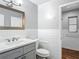 Bathroom featuring a tile shower and updated vanity sink at 7280 Tarrytown Dr, Spring Hill, FL 34606