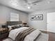 This lovely bedroom features a ceiling fan and picture frame on the wall at 7280 Tarrytown Dr, Spring Hill, FL 34606