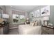 Cozy bedroom featuring neutral color palette, natural light, and fashionable decor at 735 Sky Shade Dr, Apollo Beach, FL 33572