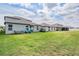 Large, well-maintained backyard offering ample space for entertainment and recreation at 754 8Th Nw St, Ruskin, FL 33570