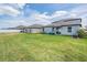 Spacious backyard perfect for outdoor activities and relaxation with patio seating at 754 8Th Nw St, Ruskin, FL 33570