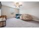 Bright bedroom featuring modern furniture, neutral paint, and plush carpet providing a perfect place to relax at 754 8Th Nw St, Ruskin, FL 33570