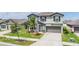 Beautifully landscaped two-story home with a manicured lawn and inviting curb appeal at 754 8Th Nw St, Ruskin, FL 33570