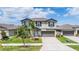 Charming two-story home with well-manicured landscaping and a welcoming entrance at 754 8Th Nw St, Ruskin, FL 33570