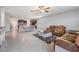 The open-concept living room seamlessly flows into a dining area and kitchen, perfect for entertaining at 754 8Th Nw St, Ruskin, FL 33570