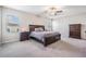 The Primary bedroom features large windows, a ceiling fan, and neutral colors at 754 8Th Nw St, Ruskin, FL 33570