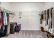 Spacious walk-in closet with shelving and hanging space for clothes and accessories at 754 8Th Nw St, Ruskin, FL 33570