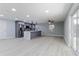 Stylish kitchen with an island, stainless appliances, and seamless access to the outdoor area at 7919 Rusty Oak Dr, New Port Richey, FL 34653