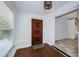 Home's entry featuring a decorative front door and tile flooring leading to the interior spaces at 8054 38Th N Ave, St Petersburg, FL 33710