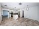 Eat in kitchen with tile floors, an island, stainless steel appliances, and updated cabinets at 8054 38Th N Ave, St Petersburg, FL 33710