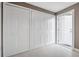 Basement featuring a door to the exterior at 8402 Woodlake Dr, Tampa, FL 33615