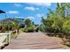Wooden dock offering direct access to the waterfront and surrounding neighborhood views at 9118 Brunswick Ln, Tampa, FL 33615