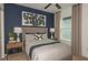 Well-lit bedroom featuring a large window and neutral color scheme at 9959 Trellis Vine Way, Parrish, FL 34219