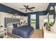 Comfortable bedroom with a large window for ample natural light at 9959 Trellis Vine Way, Parrish, FL 34219