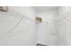 Walk-in closet with white wire shelving and ample storage space for organization at 1004 Spotted Egret Loop, Ruskin, FL 33570