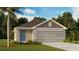 Charming single-story home with a two-car garage and tropical landscaping enhancing its curb appeal at 1006 Spotted Egret Loop, Ruskin, FL 33570