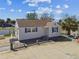 Elevated shot of a single-Gathering home offering a view of its layout and surrounding neighborhood at 101 146Th Ave, Madeira Beach, FL 33708