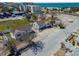 Birds-eye view showcasing a house near the beach with surrounding trees and nearby neighborhood at 101 146Th Ave, Madeira Beach, FL 33708