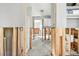 A glimpse into the bathroom, connected to the kitchen and complemented by ceiling fan at 101 146Th Ave, Madeira Beach, FL 33708