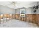 Spacious bedroom featuring one window that bring in natural light, ceiling fan, and gray walls at 101 146Th Ave, Madeira Beach, FL 33708