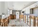 Bright, partially renovated kitchen featuring modern cabinets with exposed studs at 101 146Th Ave, Madeira Beach, FL 33708