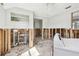 Laundry room with exposed framing, showcasing potential for a customized design at 101 146Th Ave, Madeira Beach, FL 33708