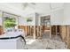 Laundry room space showcasing exposed framing and potential for a personalized renovation at 101 146Th Ave, Madeira Beach, FL 33708