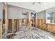 An open-concept living space with a glimpse into the kitchen and a bright, inviting atmosphere at 101 146Th Ave, Madeira Beach, FL 33708