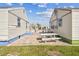 Outdoor patio featuring a picnic table between two cottages, creating a communal gathering space at 101 146Th Ave, Madeira Beach, FL 33708