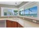 Kitchen sink with a stunning view of the waterfront at 11050 7Th E St, Treasure Island, FL 33706