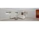 Open-concept living room with hardwood floors and comfortable seating for relaxation at 11050 7Th E St, Treasure Island, FL 33706