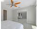 Main bedroom with ensuite bath and living room entrance at 11050 7Th E St, Treasure Island, FL 33706