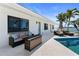 Backyard patio with seating, perfect for relaxation at 11050 7Th E St, Treasure Island, FL 33706