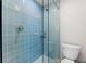 Modern tiled shower with glass door at 11050 7Th E St, Treasure Island, FL 33706