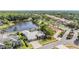 Aerial view of house with a pond in the backyard at 1307 Forestedge Blvd, Oldsmar, FL 34677