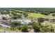 Scenic aerial view of the country club features lush greenery, and manicured landscaping at 1307 Forestedge Blvd, Oldsmar, FL 34677