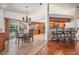 Dining area adjacent to the kitchen with breakfast bar seating at 1307 Forestedge Blvd, Oldsmar, FL 34677