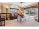 Inviting living room with pool view, comfortable seating, and stylish decor at 1307 Forestedge Blvd, Oldsmar, FL 34677