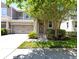 Charming two-story home featuring a well-manicured lawn and an attached two-car garage at 14616 Rocky Brook Dr, Tampa, FL 33625