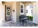 Inviting front porch features a quaint bench and stylish decorations, perfect for relaxing at 14616 Rocky Brook Dr, Tampa, FL 33625