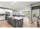 Open-concept kitchen seamlessly connected to the living area, creating a bright and inviting space at 14616 Rocky Brook Dr, Tampa, FL 33625