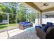 Inviting screened lanai with comfortable seating, perfect for outdoor relaxation and entertainment at 14616 Rocky Brook Dr, Tampa, FL 33625