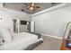 Spacious primary bedroom with a tray ceiling and ample space for relaxation at 14616 Rocky Brook Dr, Tampa, FL 33625