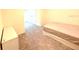 Carpeted bedroom featuring a closet, bare mattress, and dresser at 1490 Colt Creek Pl, Wesley Chapel, FL 33543