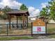 This dog park provides a shaded area with benches and a dedicated space for furry friends to play at 1490 Colt Creek Pl, Wesley Chapel, FL 33543